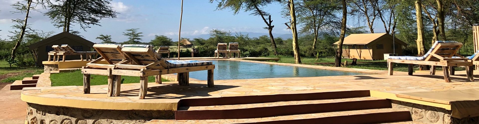 Zambúllete en una agradable piscina tras un largo viaje en este alojamiento de Africa Safari